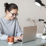 woman using computer laptop scaled 1